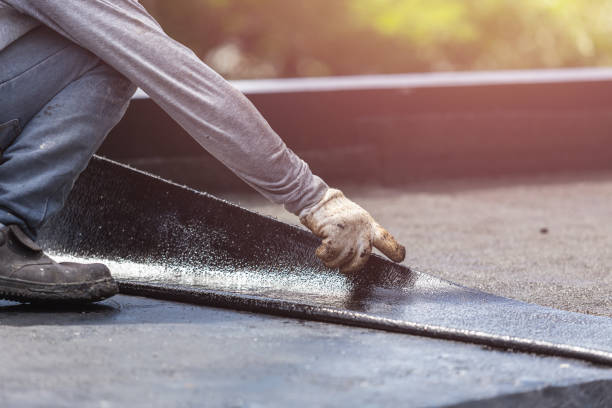 Professional Basement Waterproofing technician working in King George, VA